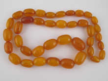 A graduated amber bead necklace