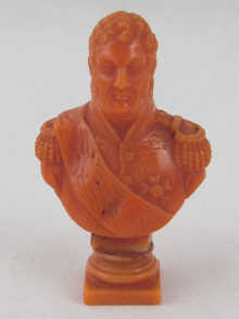 A carved coral seal designed as