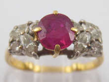 A ruby and diamond ring the central