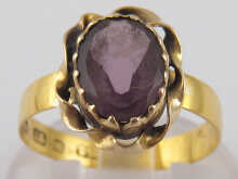 An amethyst ring with a 22 carat