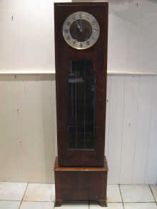 An Art Deco longcase clock with 149cdc