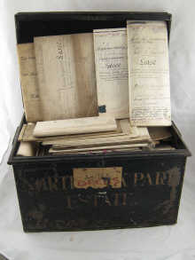 A large metal deed box containing