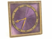 An 8 day boudoire clock retailed by