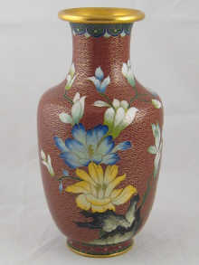 A cloisonn enamelled brass vase