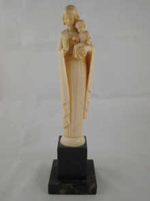 An ivory carving of mother and child