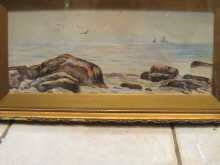 A watercolour seascape signed and dated