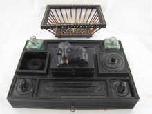 An Indian ebony desk inkstand with