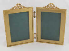 A gilt metal double photo frame 149d17