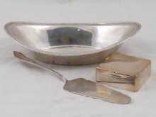 An oval silver bread dish hallmarked