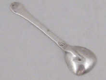 A silver Trefid condiment spoon