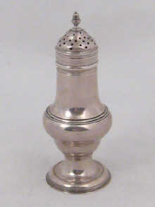 A Georgian silver pepper by Thomas