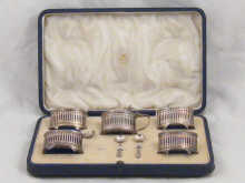 Asprey & Co; a boxed silver cruet