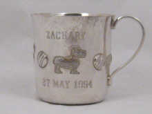 A silver Tiffany christening cup