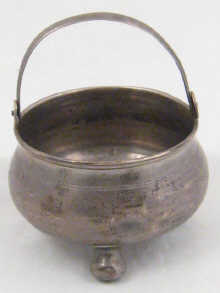 A Russian silver cauldron on three