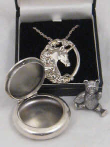 A silver unicorn pendant by Brooks 149d7a