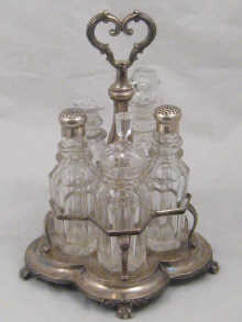 A five bottle Russian silver cruet