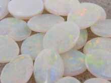 A quantity of white opals all oval 149d9a