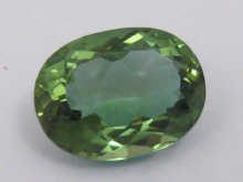 A loose polished prasiolite gemstone