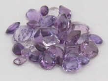 A quantity of loose polished amethyst 149d96