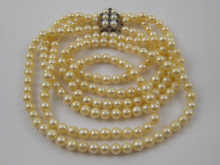A three row cultured pearl necklace 149db1