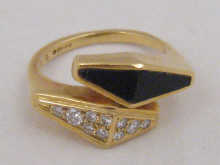An 18 carat gold ring of geometric design