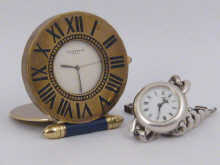 A Cartier quartz travelling clock