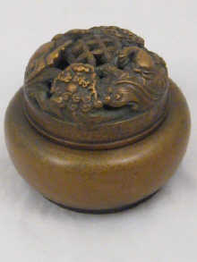 A Chinese bronze incense burner