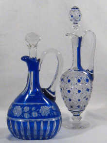 Two blue overlay cut glass claret