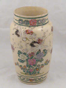 A ceramic vase the cream glazed