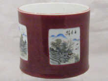 A large Chinese brush pot the red glaze