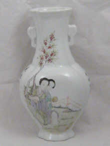 A two handled Chinese vase with ladies