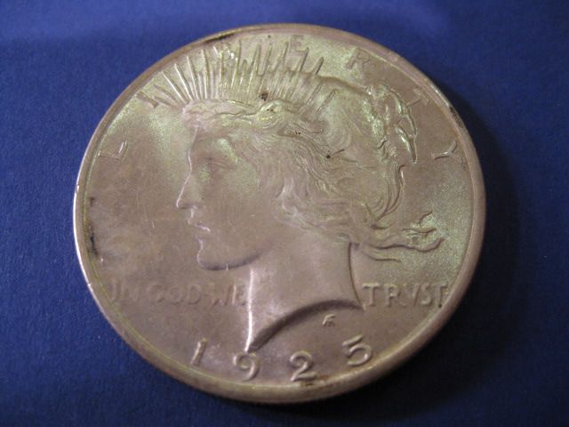1925 U.S. Peace Silver Dollar uncirculated.