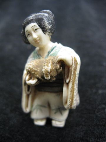 Carved Ivory Netsuke of Woman with