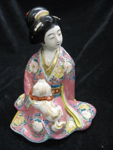 Japanese Porcelain Figurine of