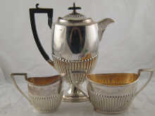 A three piece silver coffee set 14a614