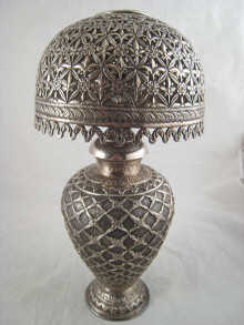 A silver table lamp and shade the
