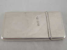 A patented slim sprung top silver card