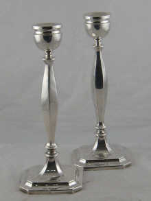 A pair of silver candlesticks Birmingham
