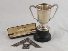 A mixed lot comprising a silver trophy