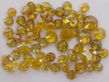 A quantity of loose polished yellow