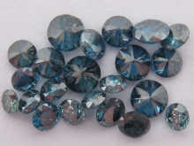 A quantity of loose polished blue