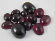 A quantity of loose polished cabochon 14a65f