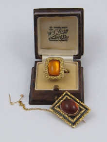 A yellow metal (tests gold) stone set