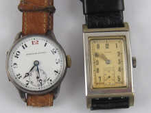 A round silver wrist watch with 14a6c8
