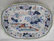 A large stoneware dish the underside