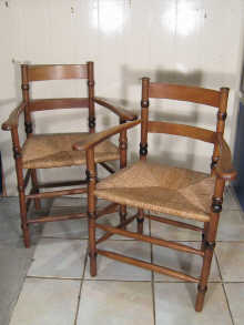 A pair of Arts and Crafts beechwood