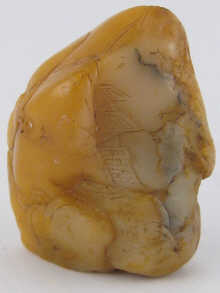 A Chinese yellow soapstone seal of irregular