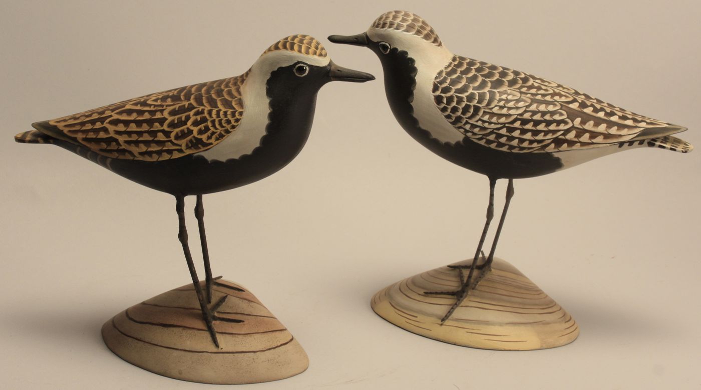 TWO DECORATIVE PLOVER CARVINGSBy 14a7a8