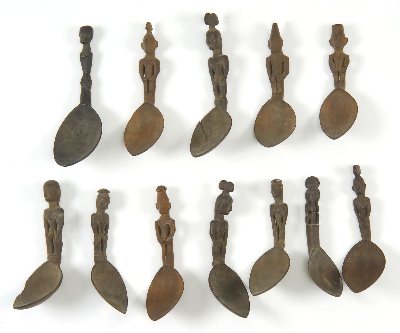 TWELVE PHILIPPINE IFUGAO WOODEN SPOONSLate