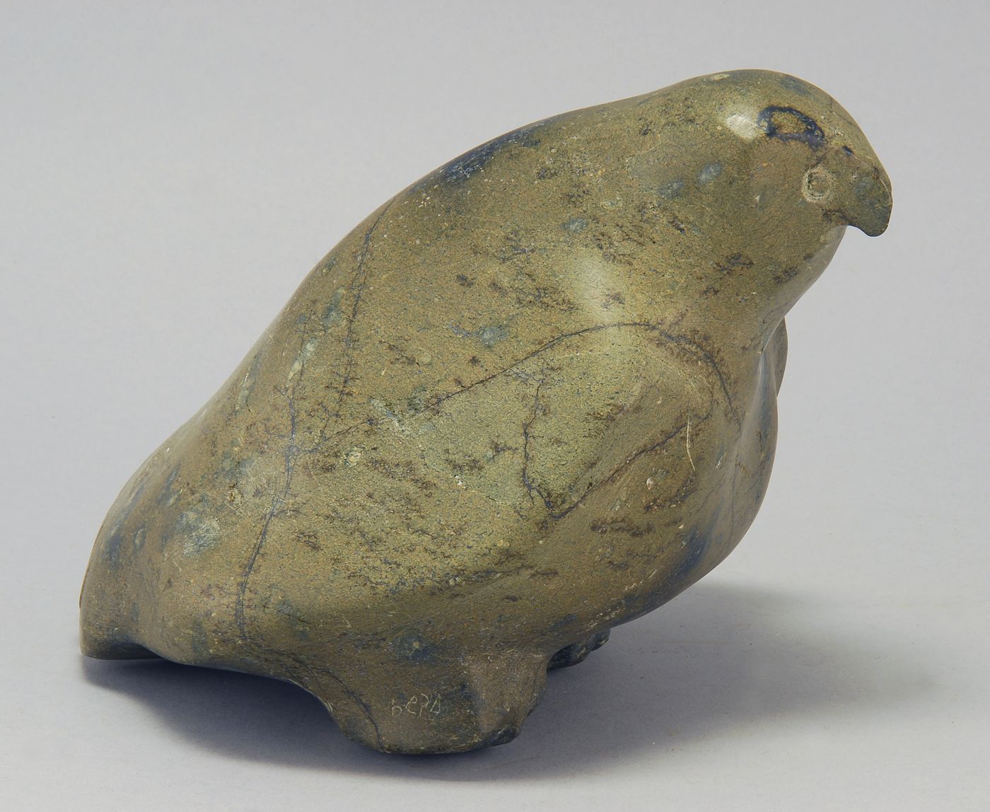 INUIT STONE CARVED FIGURE OF AN
